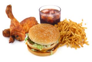 Bad foods and drinks that damage your teeth should be limited or avoided
